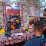 Barber using a Lumos Box